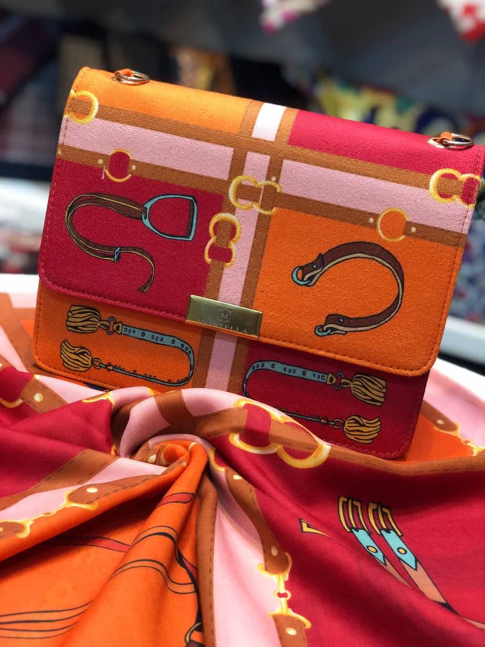 ست کیف و روسری و زنانه باکیفیت رنگ نارنجی طرح هرمس کمربندی با کیف پاسپورتی دسته زنجیری با ارسال رایگان کد mo297